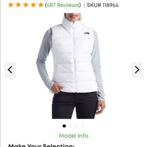 Small white & black north face vest